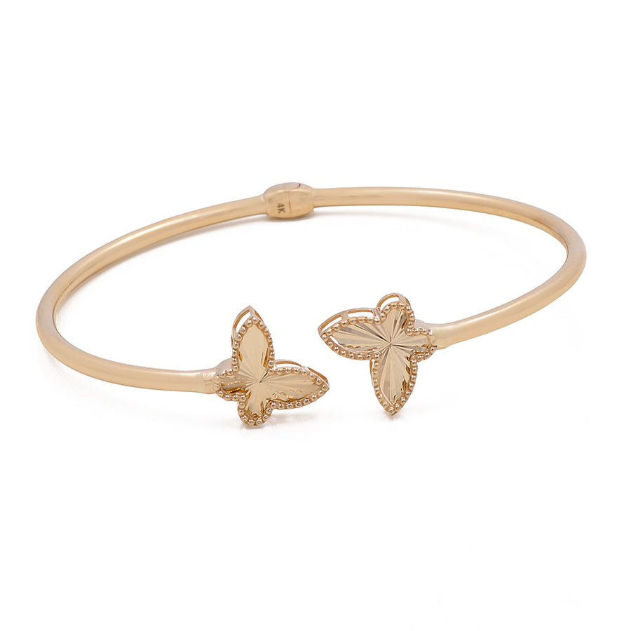 Miral Jewelry's 14K Gold Fashion Butterfly Bracelet featuring two butterfly designs with intricate detailing, displayed against a white background.