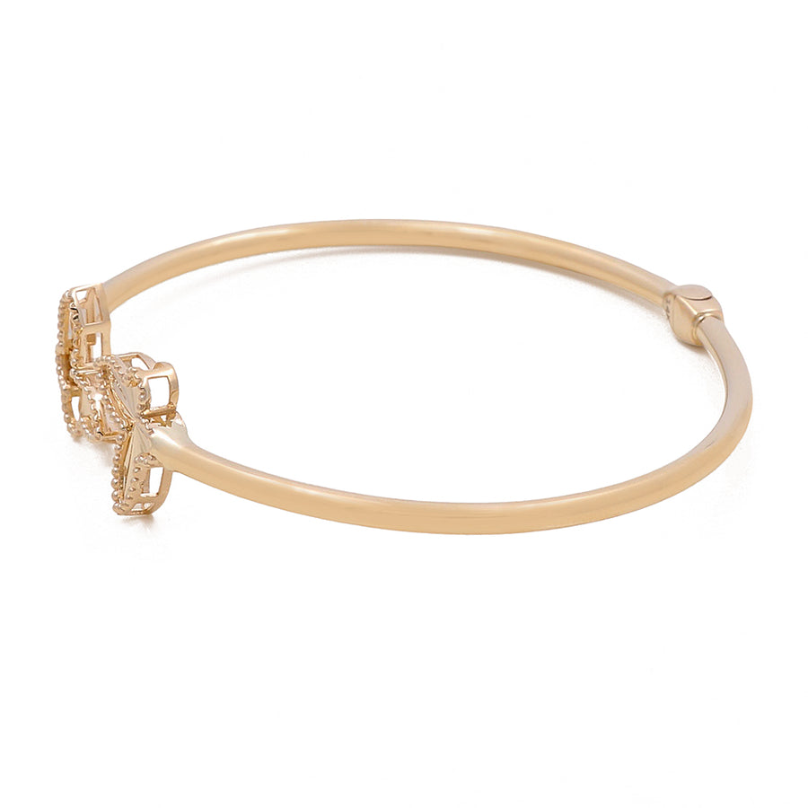 Miral Jewelry's 14K Gold Fashion Butterfly Bracelet with an intricate clasp design on a white background.