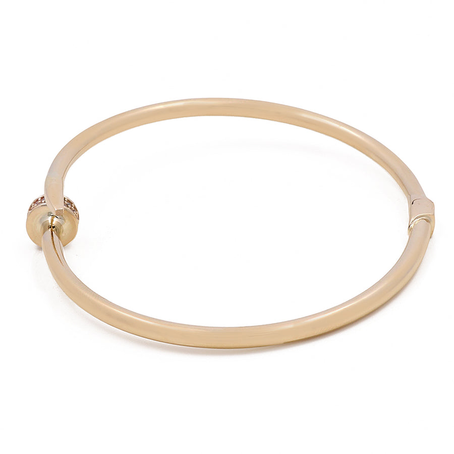 Miral Jewelry's 14K Gold Fashion Nail Bracelet with a simple, sleek design and a hinge and pin clasp, displayed on a white background.