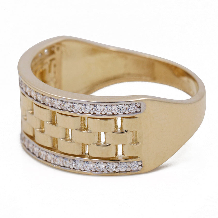 Miral Jewelry's 14K Yellow Gold Fashion Links Ring with Cubic Zirconias features a unique geometric design with three rows of small cubic zirconias set in a band.