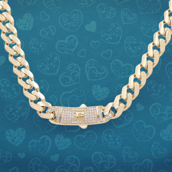A gold chain with diamonds on it.
