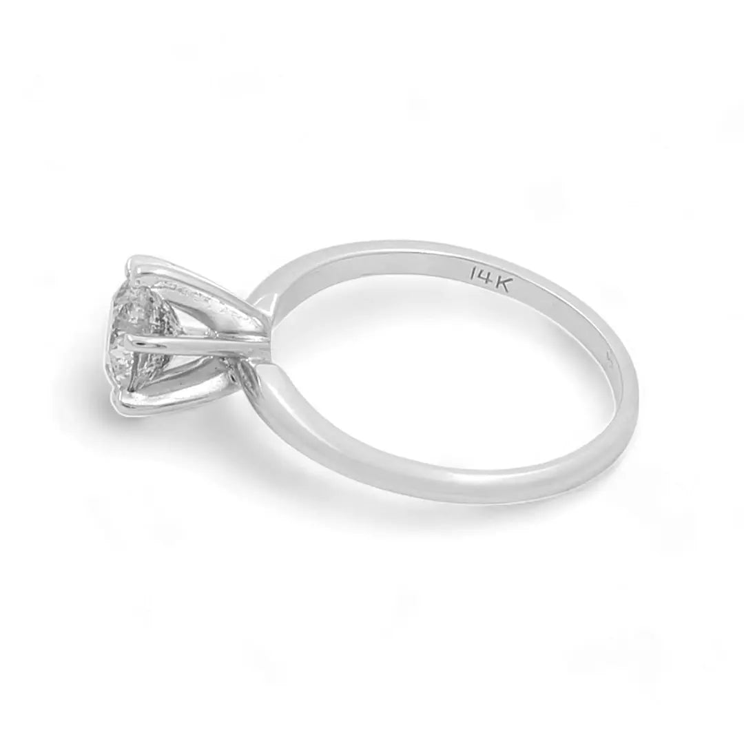 An elegant 14K White Gold Bridal Woman's Ring with Diamonds from Miral Jewelry is showcased on a pristine white background.