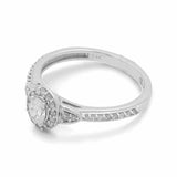 The Miral Jewelry 14K White Gold Bridal Woman Ring with Diamonds showcases a stunning silver band, adorned with a round-cut central gemstone encircled by smaller diamonds and featuring an elegant open shank design, making it the perfect engagement ring.