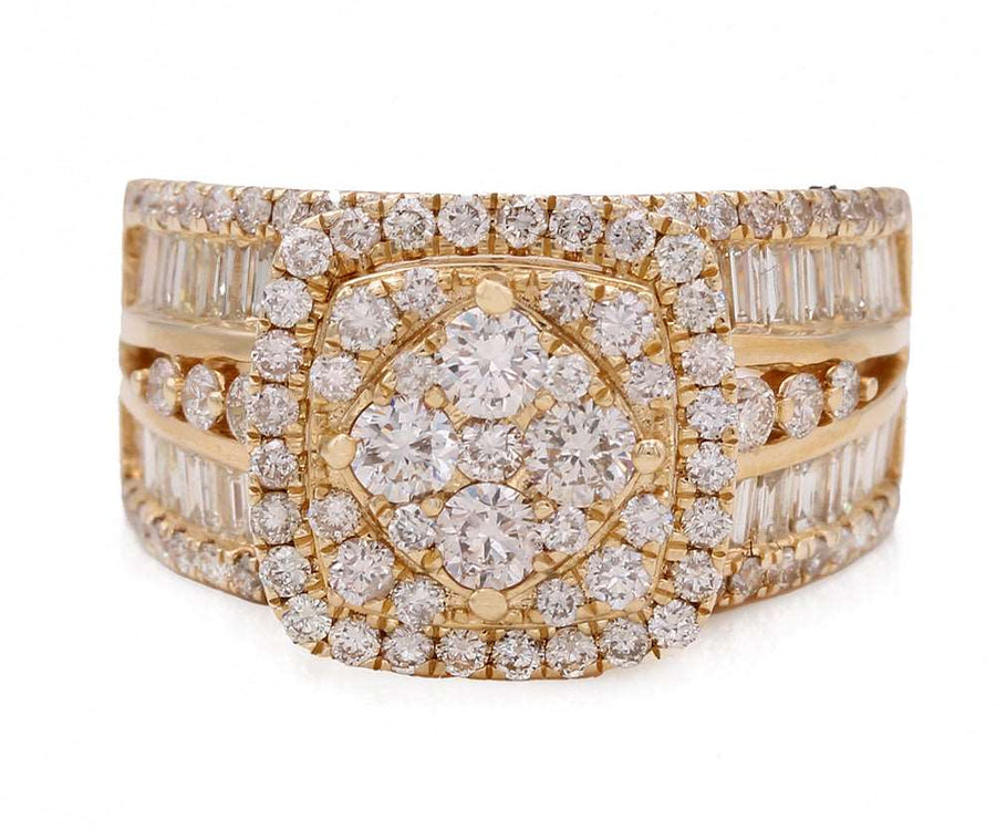 A Miral Jewelry 14K Yellow Engagement Ring 2.59TDW In Diamonds with baguettes.