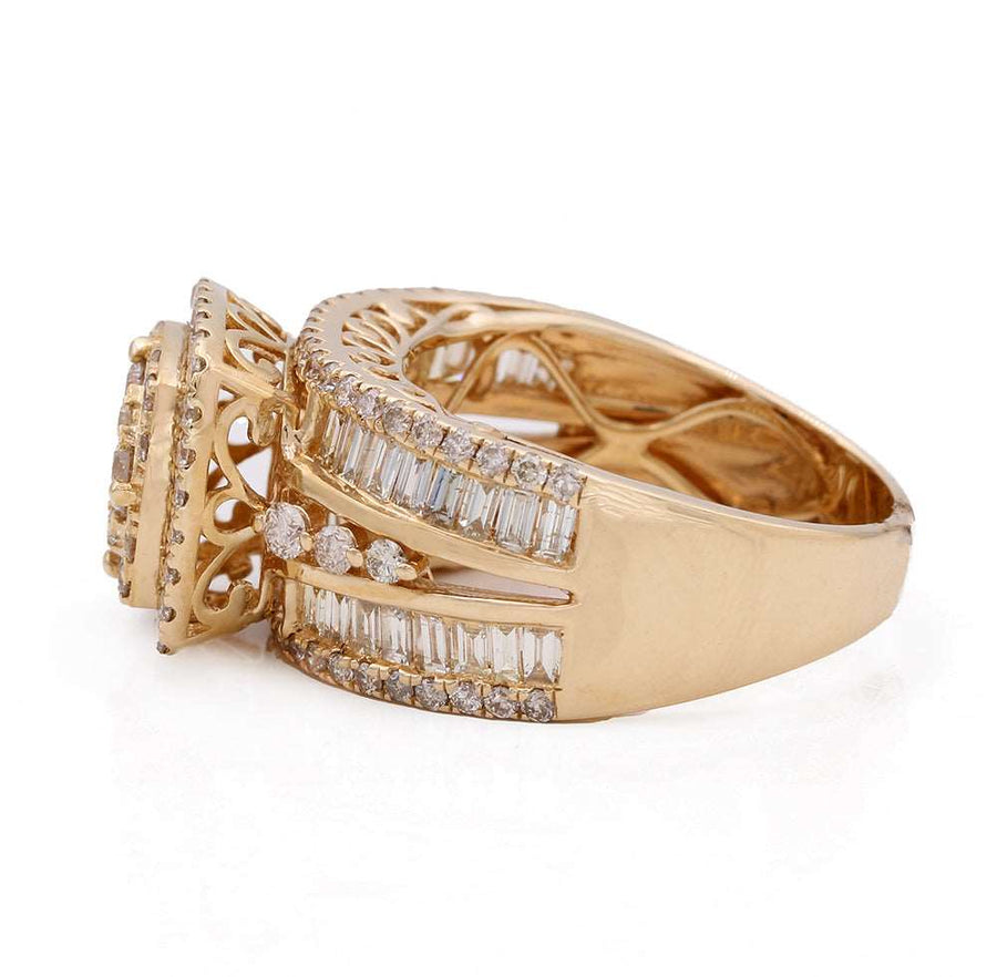 A stunning Miral Jewelry 14K Yellow Engagement Ring 2.59TDW In Diamonds adorned with sparkling diamonds and baguettes.