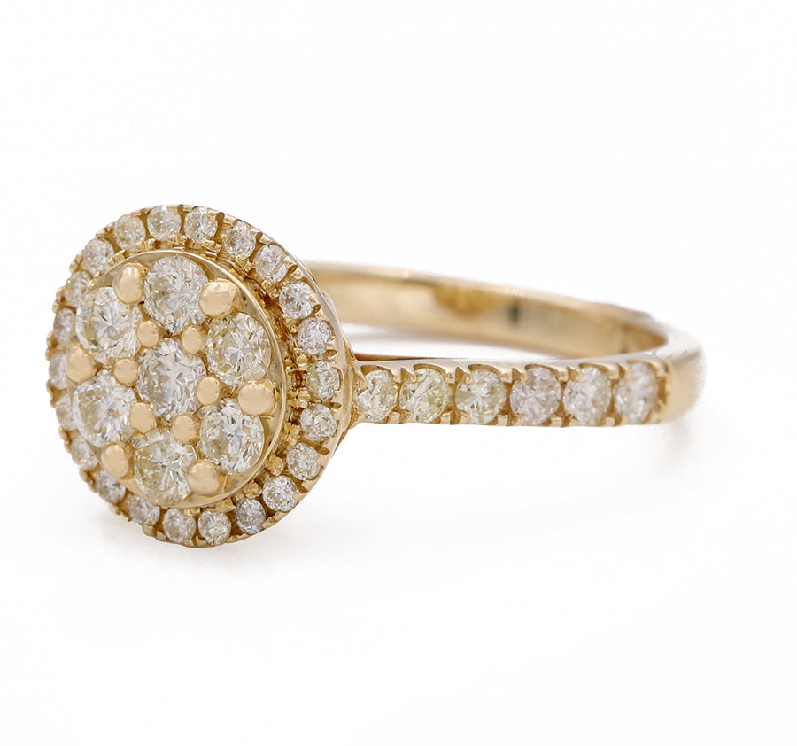 A Miral Jewelry contemporary diamond ring featuring a cluster of 1.44 dtw diamonds set in the 14K Yellow Gold Contemporary Diamond Ring.