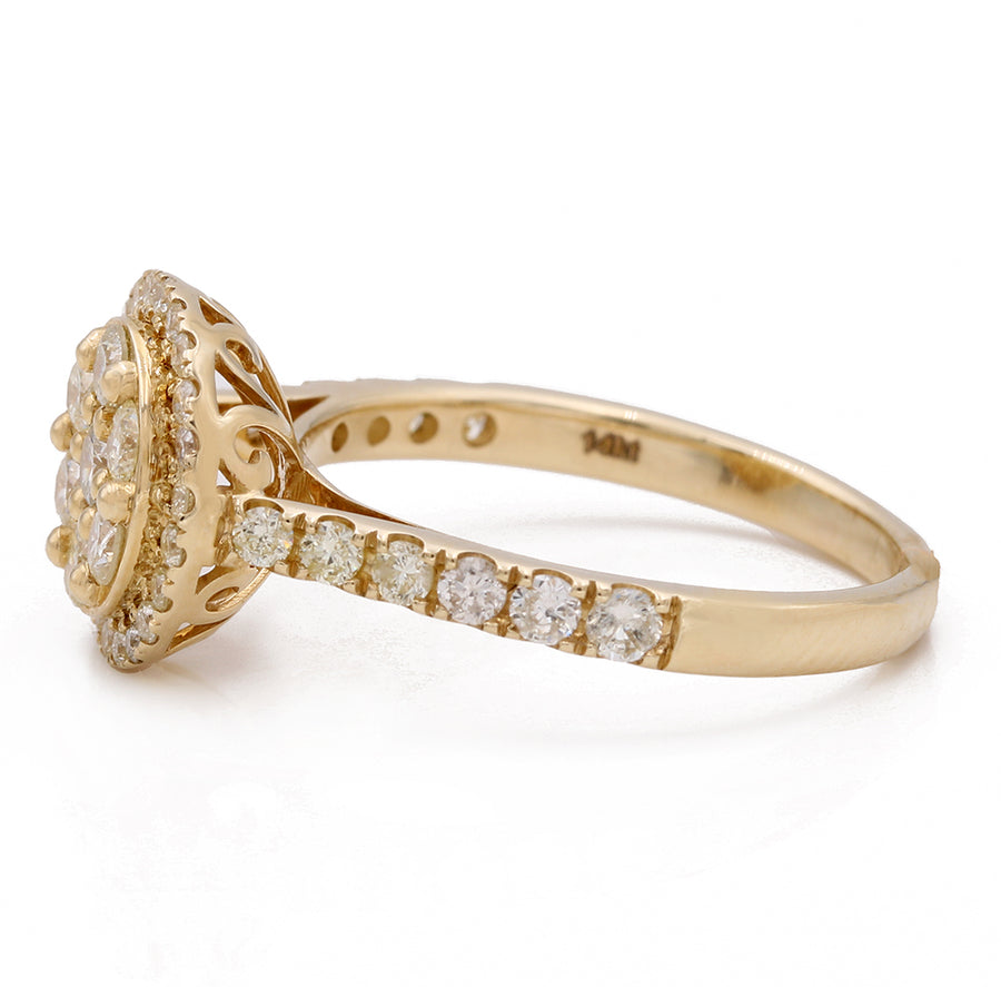 A Miral Jewelry contemporary yellow gold diamond ring with a cluster of 1.44 dtw diamonds, crafted in 14K yellow gold.