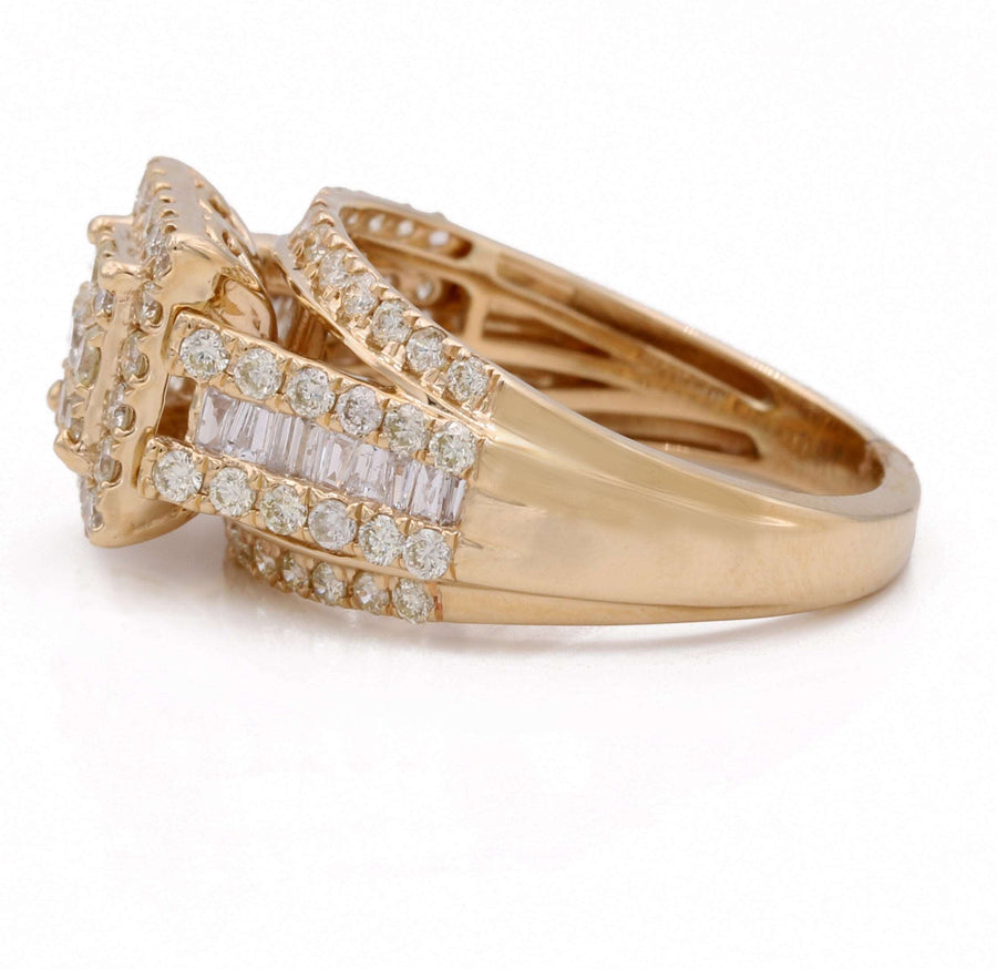 A Miral Jewelry contemporary engagement ring crafted in 14K yellow gold, adorned with exquisite baguette cut diamonds.