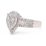 A Miral Jewelry 14K Yellow Gold Contemporary Engagement Ring featuring a pear-shaped diamond, with a total diamond weight of 1.73dtw.