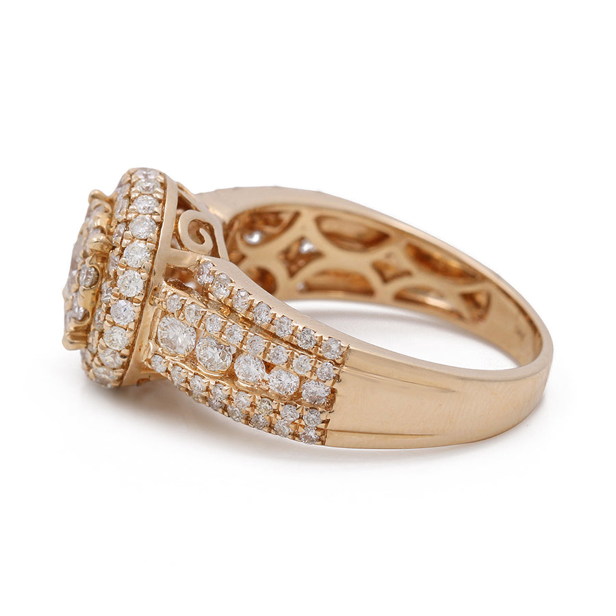 A 14K Yellow Gold Women's Contemporary Diamond Engagement Ring with 1.69 TW Round Diamonds from Miral Jewelry adorned with round diamonds in the center.