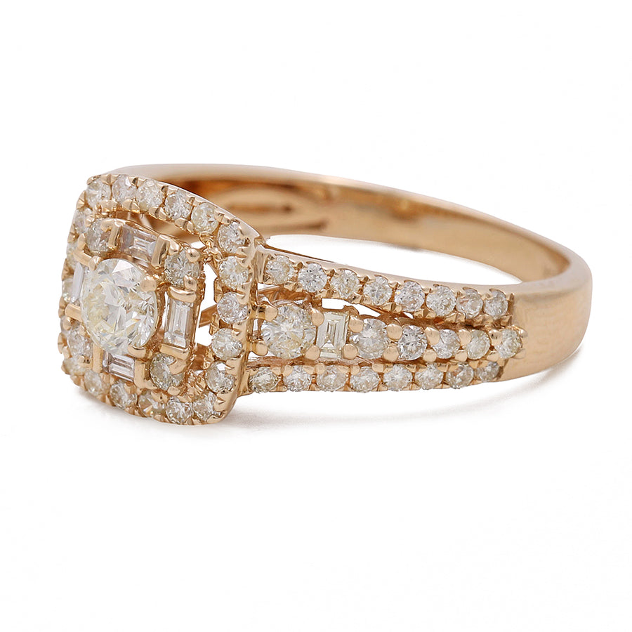 An 18k rose gold diamond ring with baguette cut diamonds and round diamonds.
Product: 14K Yellow Gold Women's Contemporary Diamond Engagement Ring with 1.15 TW Round Diamonds
Brand: Miral Jewelry