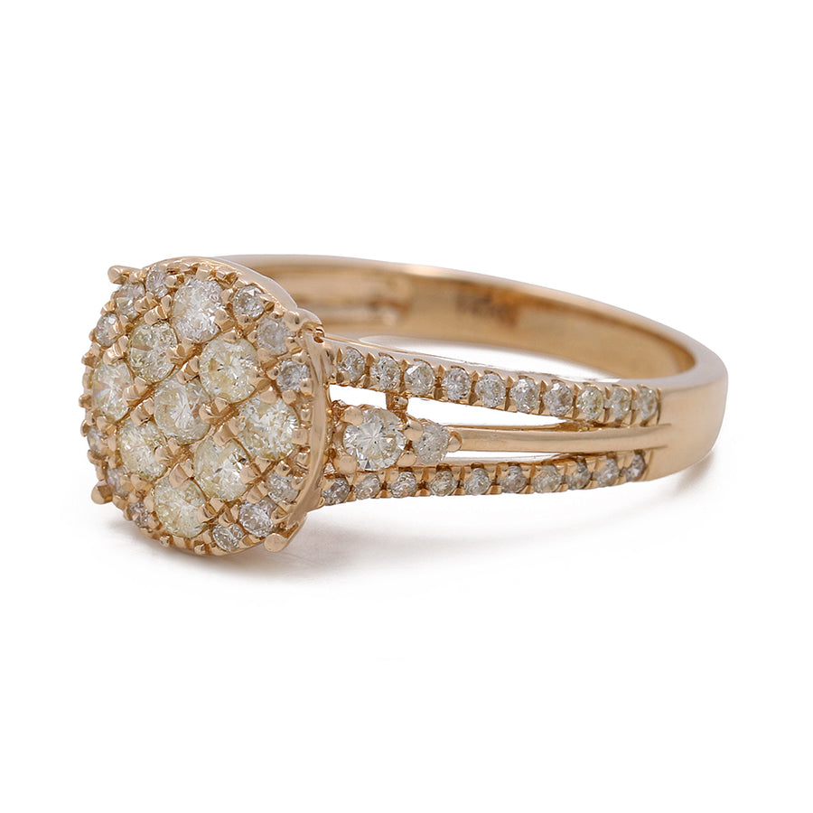 An engagement ring with a cluster of round diamonds – the 14K Yellow Gold Women's Contemporary Diamond Engagement Ring with 1.27 TW Round Diamonds by Miral Jewelry.