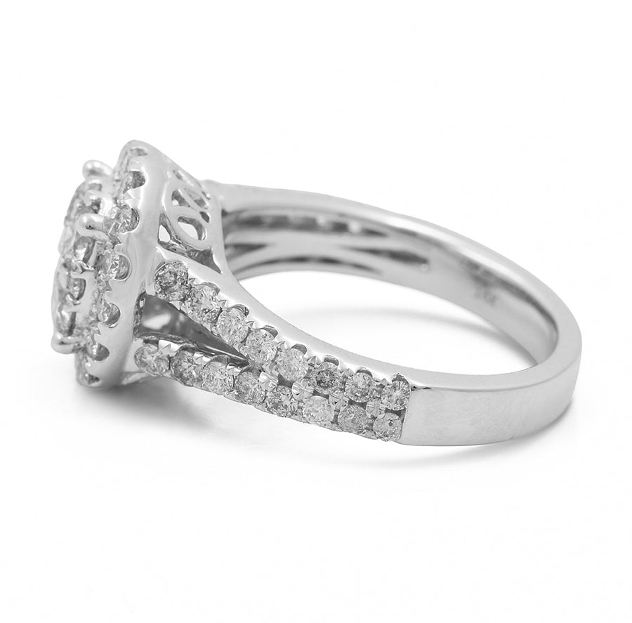 A 14K White Gold Women's Contemporary Diamond Engagement Ring with 1.89 TW Round Diamonds adorned with a halo of round diamonds from Miral Jewelry.