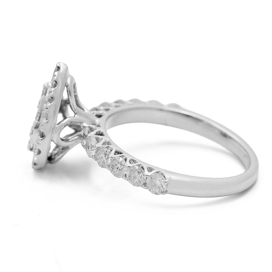 A Miral Jewelry diamond halo adorns this elegant 14K White Gold Women's Contemporary Diamond Engagement Ring with 1.77 TW Round Diamonds.