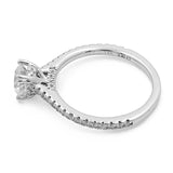 Side view of a stunning **Miral Jewelry 14K White Gold Women's Contemporary Engagement Ring with 0.20Tw Round Diamonds**, showcasing numerous round diamonds along the shank and a larger central diamond in a prong setting.