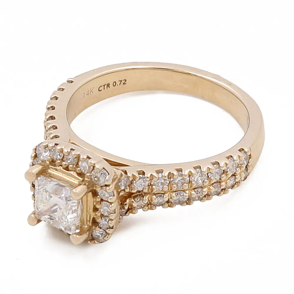 A **Miral Jewelry 14K Yellow Gold Women's Contemporary Engagement Ring with 0.75Tw Round Diamonds** with a square-shaped center diamond, two rows of smaller round diamonds on the band, and an inscription "14K CTR 0.72" inside the band. This contemporary engagement ring perfectly blends traditional elegance with modern style.