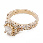 A **Miral Jewelry 14K Yellow Gold Women's Contemporary Engagement Ring with 0.75Tw Round Diamonds** with a square-shaped center diamond, two rows of smaller round diamonds on the band, and an inscription "14K CTR 0.72" inside the band. This contemporary engagement ring perfectly blends traditional elegance with modern style.