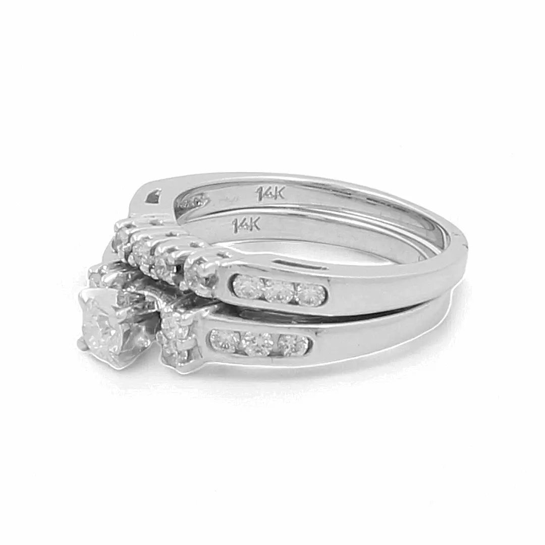Two 14K white gold bridal woman rings from Miral Jewelry, featuring embedded diamonds. One ring showcases a square-cut diamond as the central stone.