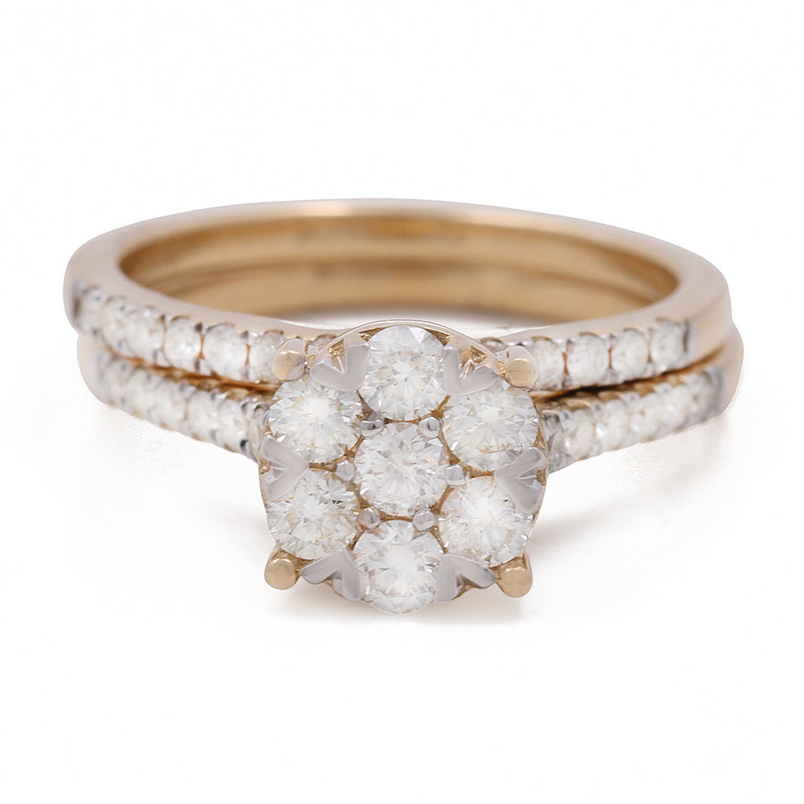 A Miral Jewelry contemporary diamond cluster ring set in 14K yellow gold.