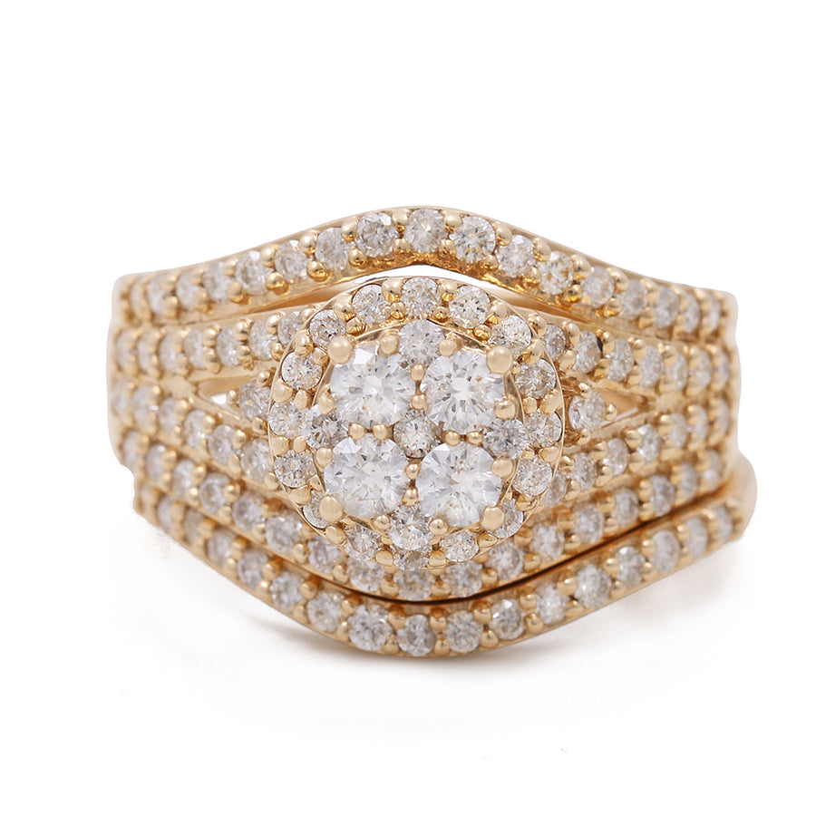 A Miral Jewelry women's contemporary diamond bridal set featuring a 1.69 TW round diamond encrusted in 14K yellow gold.
