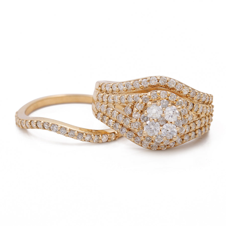 A Miral Jewelry 14K Yellow Gold Women's Contemporary Diamond Bridal Set with 1.69 TW Round Diamonds, creating a stunning diamond bridal set.