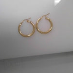 10K Yellow Gold Twisted Hoop Earrings - Miral Jewelry