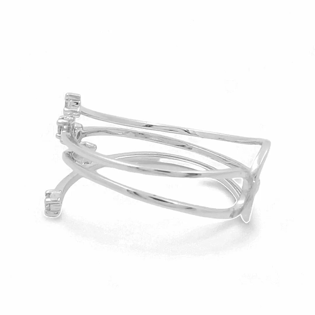 A stunning ring by Miral Jewelry, the 14K White Gold Fashion Diamond Woman Ring showcases an open band design with intricate geometric patterns and small embedded diamonds at the ends, similar in elegance to a delicate 1/4ctw Diamond Ring.