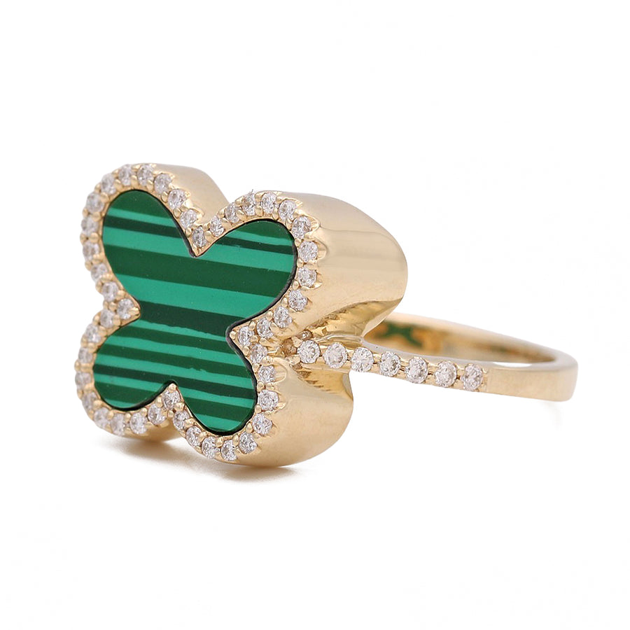 A Yellow Gold 14K Fashion Ring With Malaquite Stone by Miral Jewelry, adorned with a stunning emerald green and white diamond.