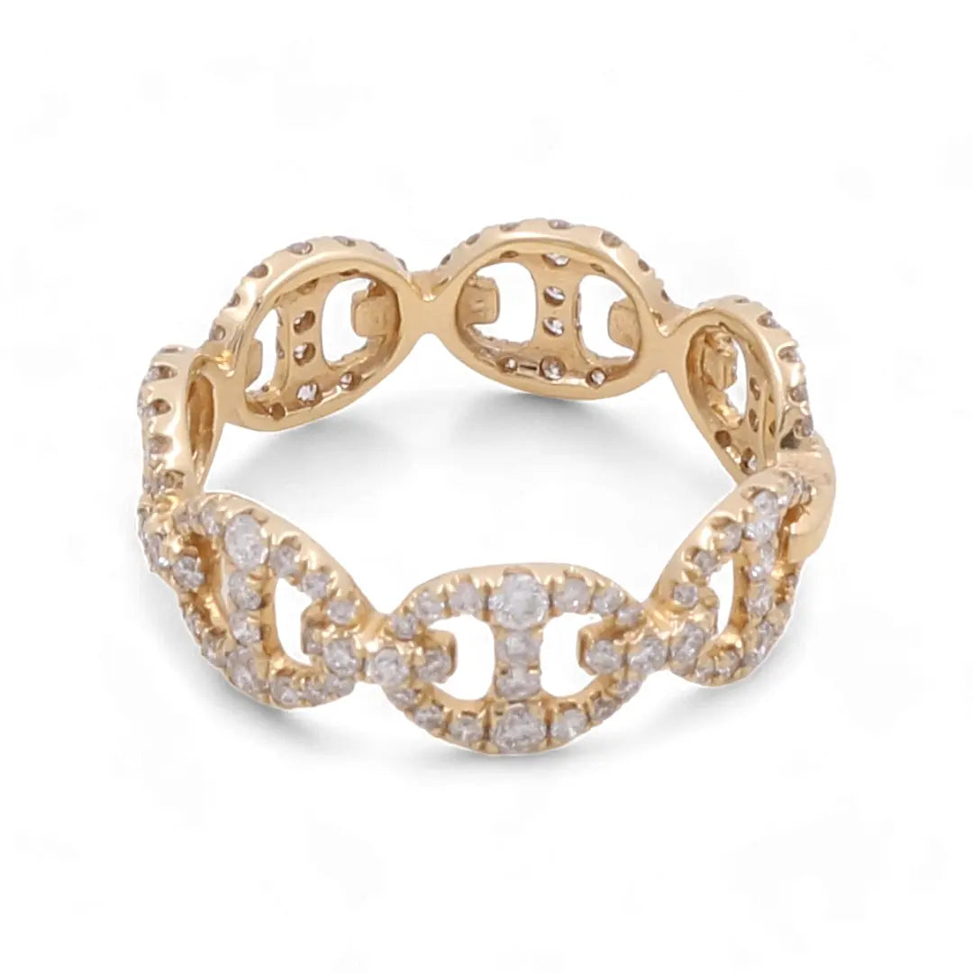The 18K Yellow Gold Fashion Diamond Woman Ring by Miral Jewelry epitomizes fashion and elegance in women's luxury jewelry with its luxurious design, featuring an intricate loop pattern adorned with small diamonds.