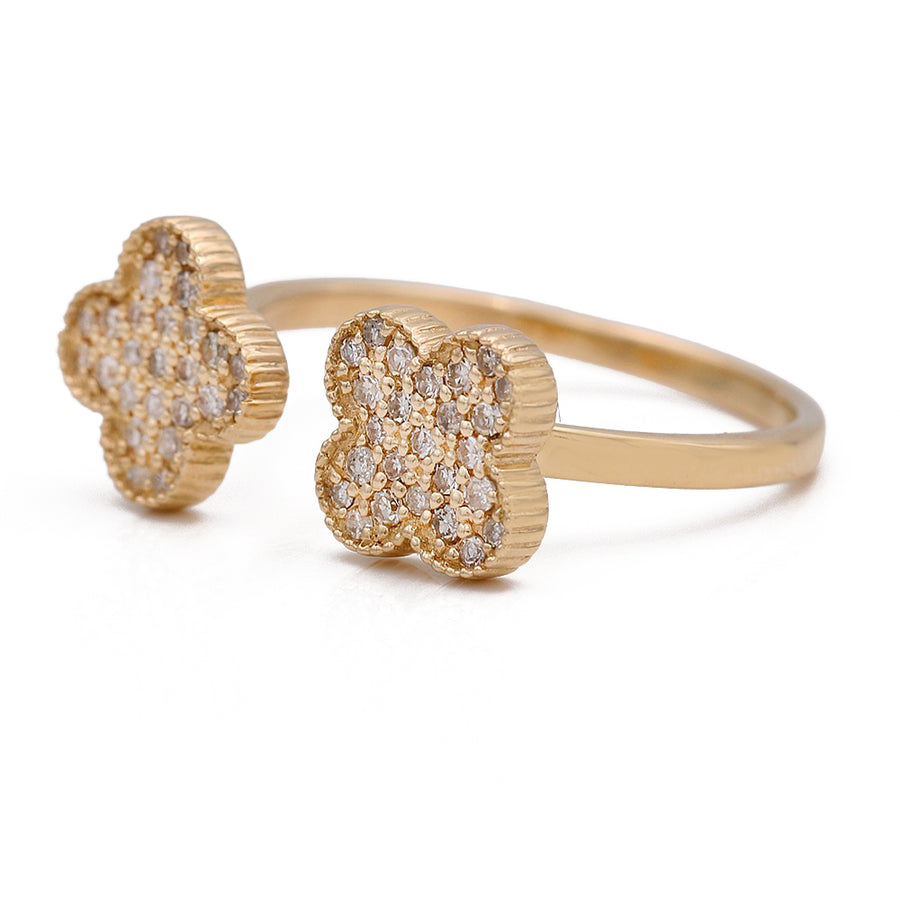 A unique design of the Miral Jewelry Yellow Gold 14K Fashion Ring With Diamonds, crafted in 14K gold, and adorned with sparkling diamonds in the center.
