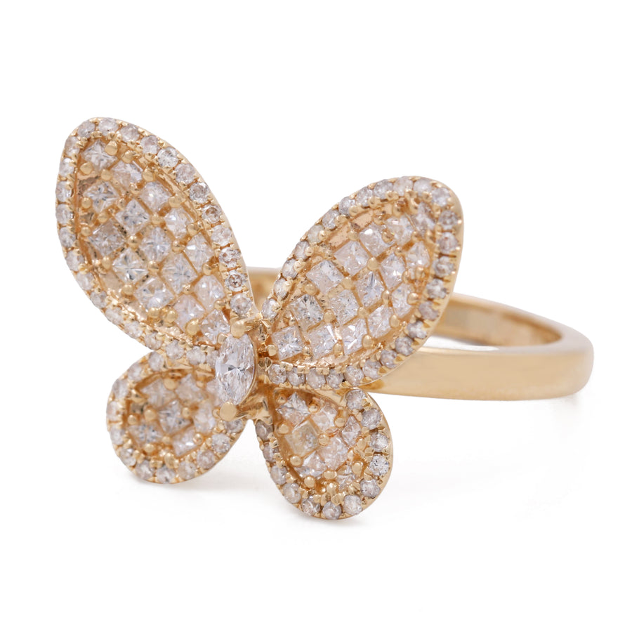 A women's Miral Jewelry 14K Yellow Gold Diamond Butterfly Ring adorned with 1.21 TW round diamonds.