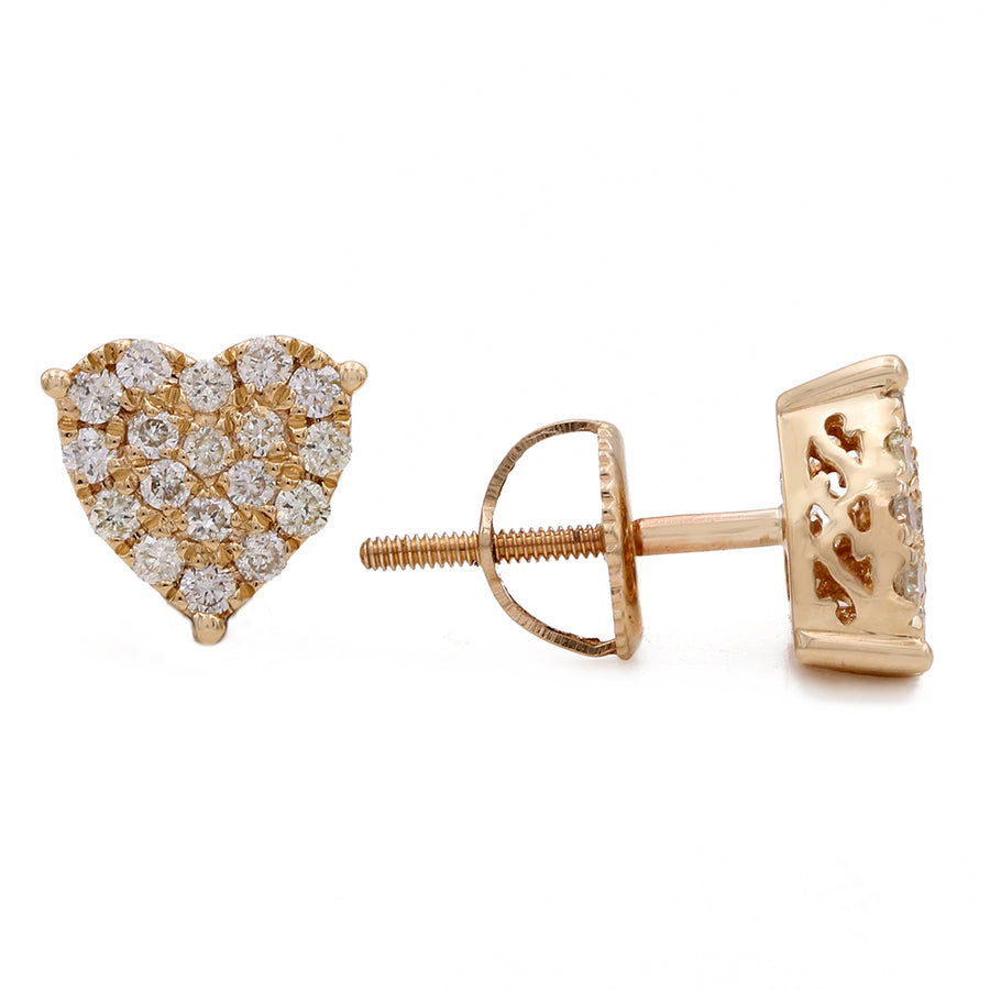 A pair ofMirali Jewelry's 14K Yellow Gold Contemporary Heart Shape Diamond Earrings, radiating sparkling elegance.