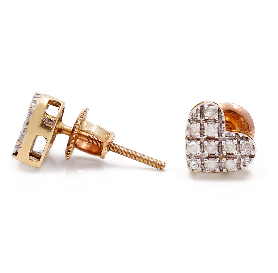 A pair of Miral Jewelry 14K gold diamond stud earrings.