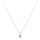 An elegant teardrop pendant hangs from a Miral Jewelry 14K yellow gold chain in this exquisite women's necklace.