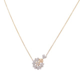 An elegant luxury jewelry piece from Miral Jewelry, the 10K Yellow Gold Fashion Diamond Women's Necklace features a pendant adorned with a cluster of small, sparkling diamonds in a captivating flower shape—ideal for any fashionable diamond women's necklace collection.