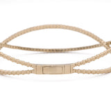 A Yellow Gold 14K Fancy Bangle Bracelet With Diamonds with a clasp by Miral Jewelry.