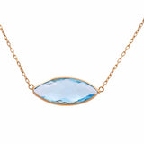 The Miral Jewelry 14K Yellow Gold Fashion Blue Topaz Women Necklace boasts a marquise-shaped blue topaz pendant elegantly set on a 14K yellow gold chain.