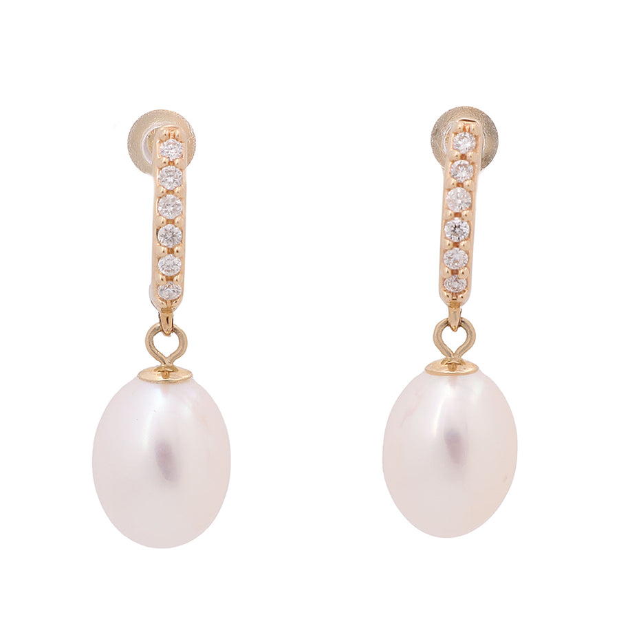 A pair of 14K Yellow Gold Miral Jewelry Pearl And Diamonds Earrings.
