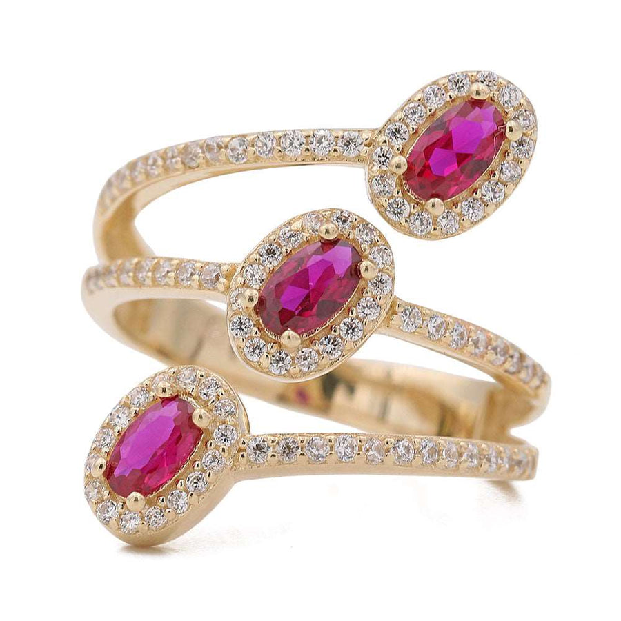 A Miral Jewelry Women's fashion ring, crafted in Yellow Gold 14k, with three ruby stones and diamonds.