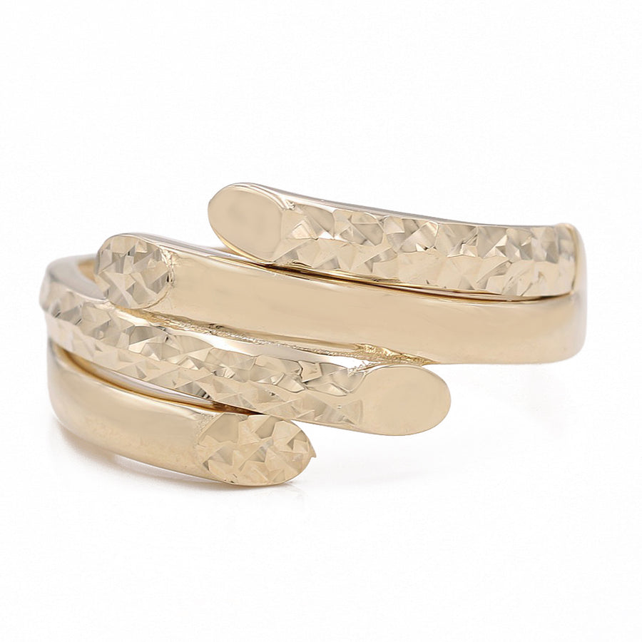 A Miral Jewelry 14K Yellow Gold Smooth and Hammered Fashion Ring, perfect for any fashion ring enthusiast and a must-have addition to your jewelry collection.