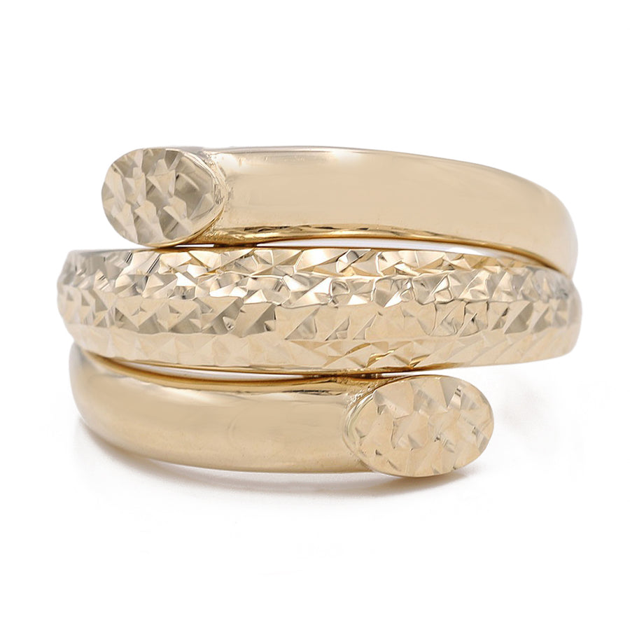 A smooth Miral Jewelry 14K Yellow Gold Smooth and Hammered Fashion Ring with three diamonds on it.