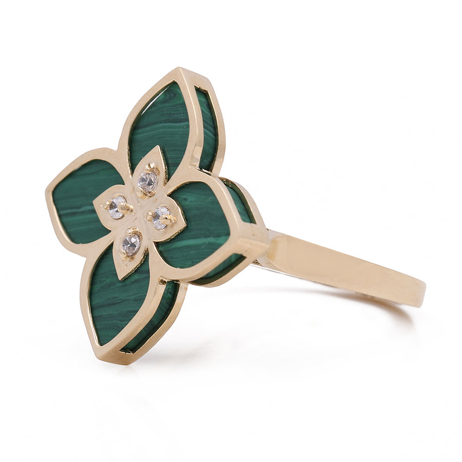 A stunning emerald green Women's Yellow Gold 14K Flower Ring adorned with sparkling diamonds, crafted in 14K yellow gold from Miral Jewelry.