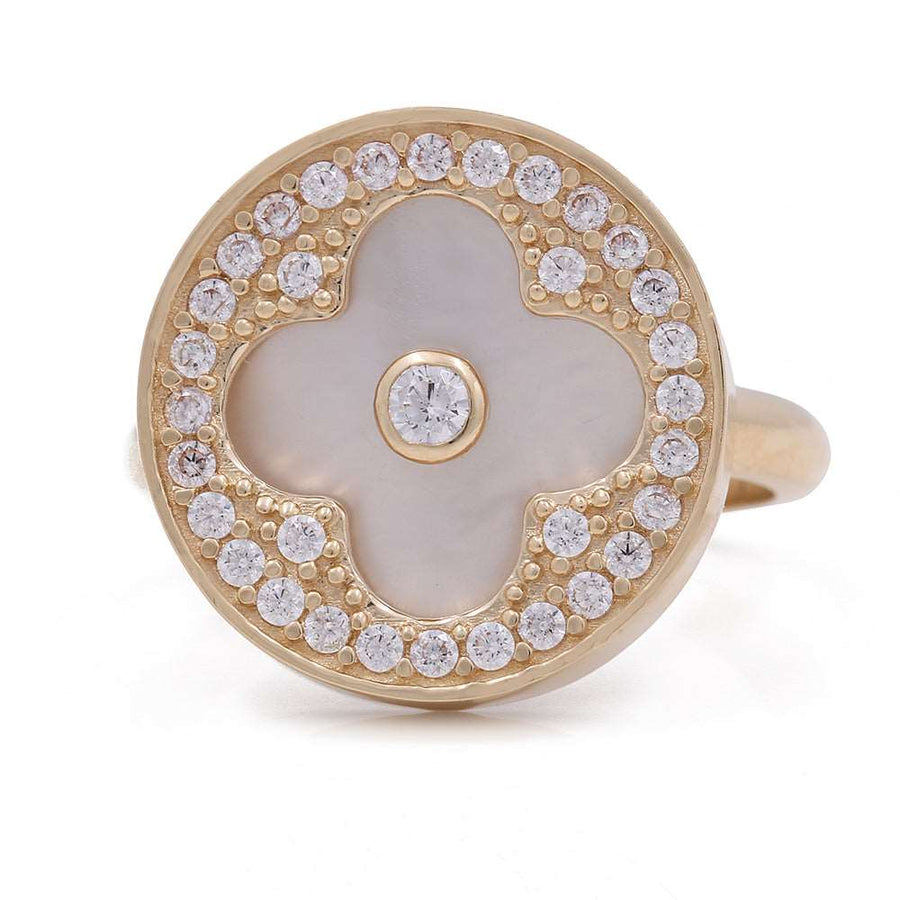 A Miral Jewelry Women's Yellow Gold 14K Flower Ring With Mother Pearl and Cz, featuring white mother of pearl and diamonds, creates a timeless fashion statement.