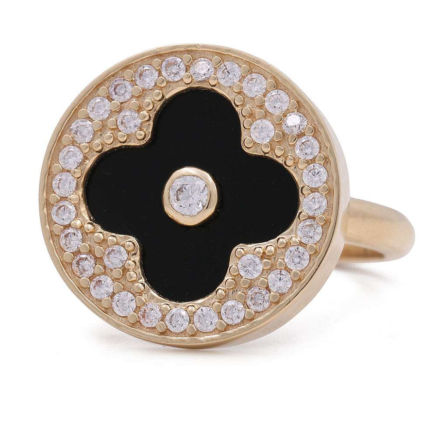 A Miral Jewelry Women's Yellow Gold 14K Flower Ring With Onyx Stone and Cz, making a statement in fashion.