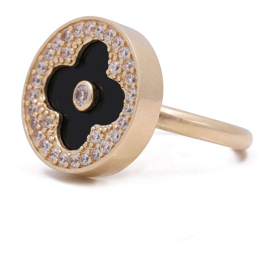 A timeless Women's Yellow Gold 14K Flower Ring With Onyx Stone and Cz adorned with diamonds, making it a fashionable accessory from Miral Jewelry.