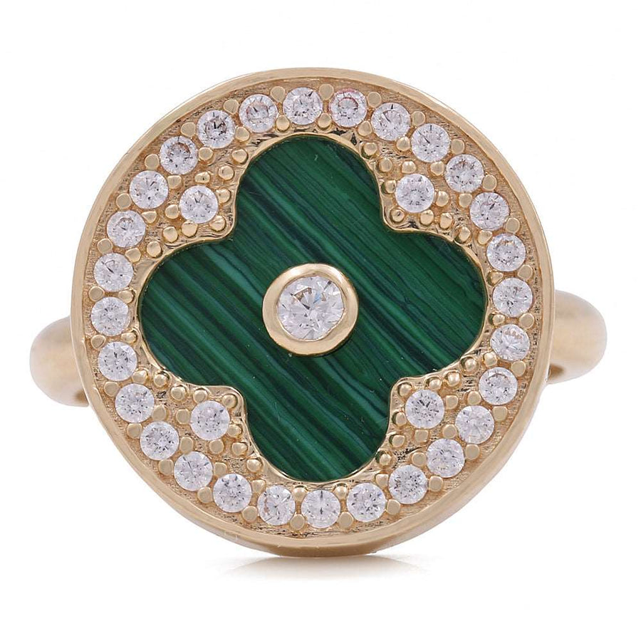 A statement fashion ring, the Women's Yellow Gold 14K Flower Ring With Malaquita Stone and Cz from Miral Jewelry, is adorned with diamonds.