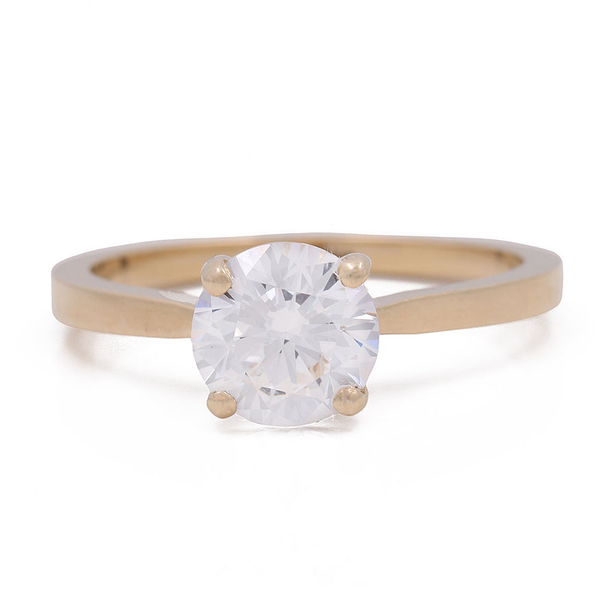 A Miral Jewelry yellow gold 14K engagement ring showcasing the timeless beauty of a white diamond.