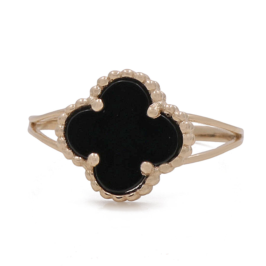 A  Miral Jewelry yellow gold plated ring with a black onyx stone, perfect for fashion-forward individuals.
