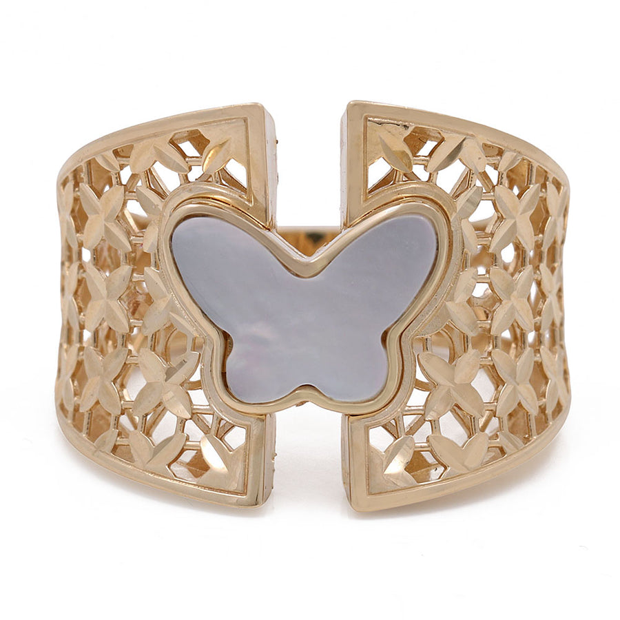 A 14K Yellow Gold Women's Fashion Butterfly Mother of Pearl Ring by Miral Jewelry, adorned with blue stones.
