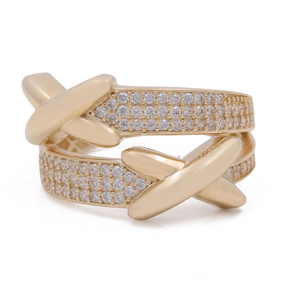 A Miral Jewelry 14K Yellow Gold Women's Fashion Cross Links Ring adorned with Cubic Zirconias.